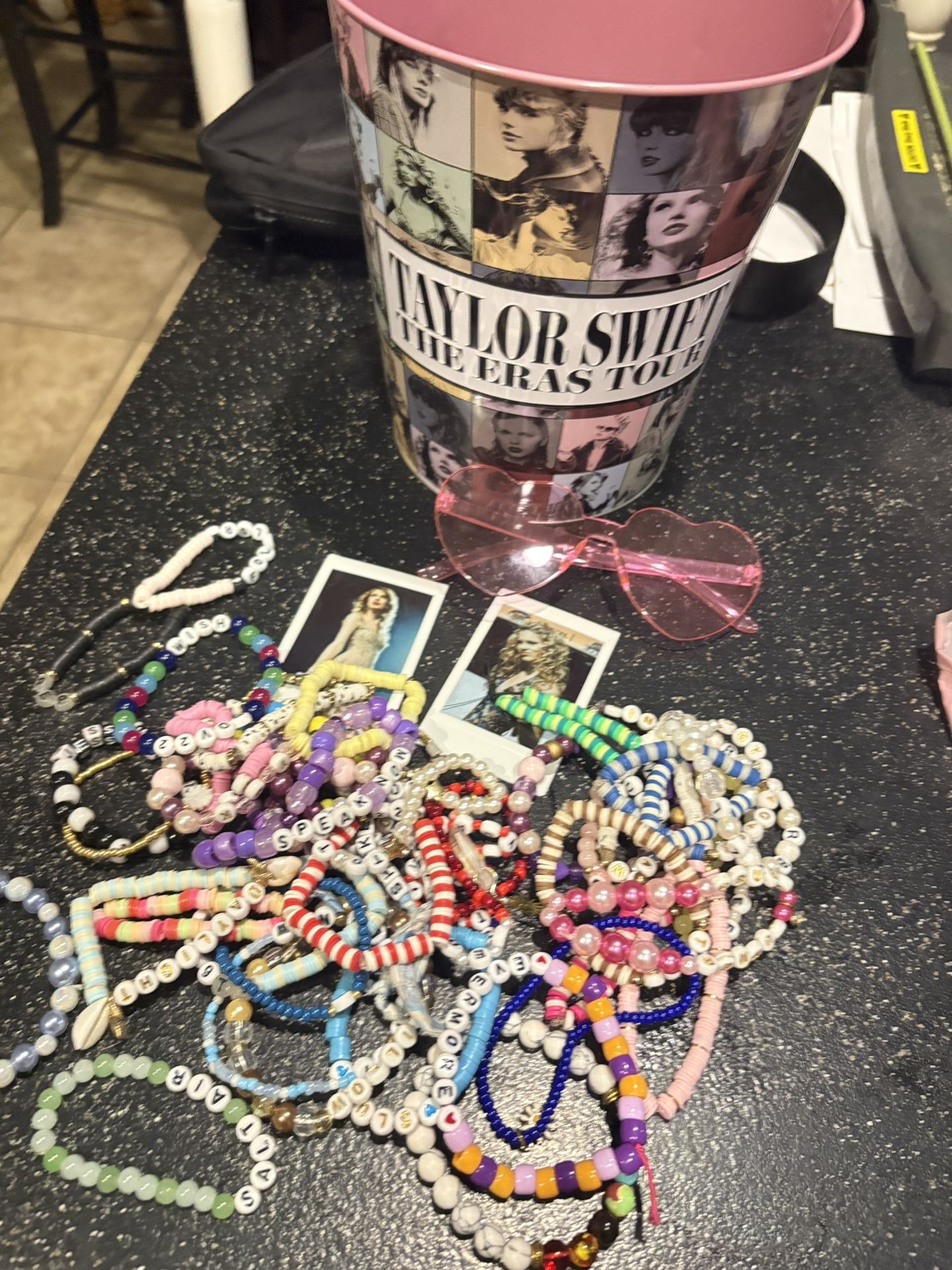 TAYLOR SWIFT eras tour movie bin + lots of friendship bracelets, two polaroids and heart shaped glasses