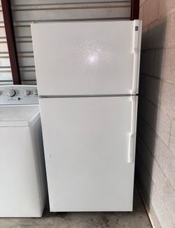 White GE Refrigerator And Freezer