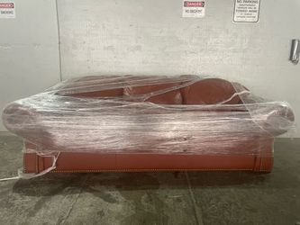 Leatherette brown sofa