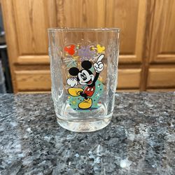 Walt Disney World 2000 Mcdonald's Commerative Glass Featuring Mickey Mouse.  Size approximately 4 1/2 inches tall.  Has been on display in a cabinet. 