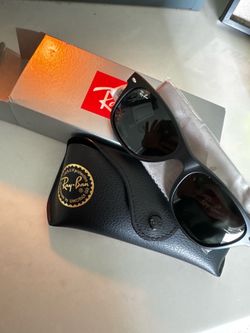 Raybans Sunglasses.