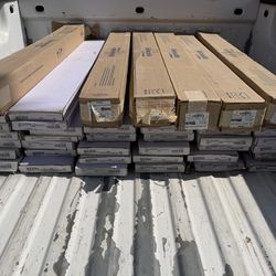 Shaw floors #2028 Salt River Vinyl glue down flooring and Tarkett rubber base board