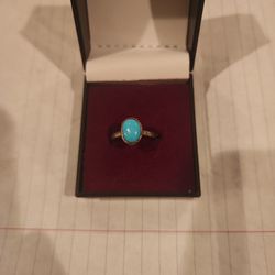 Turquoise ring.