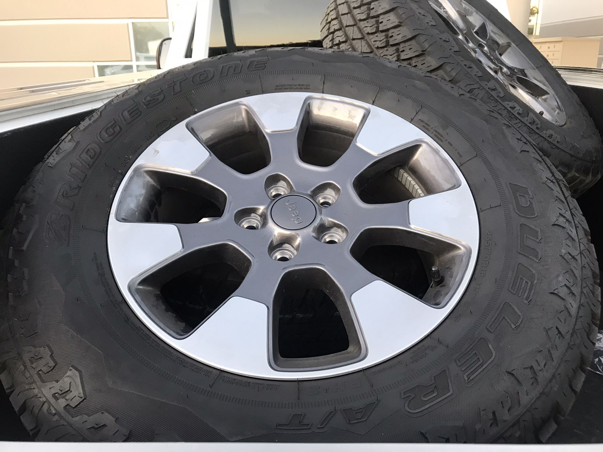 5 each Jeep rims and tires less than 1,000 miles