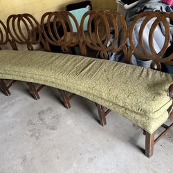 Antique Wooden Curved  Padded Bench  124 3/4” long  22 1/2” deep  21” floor to seat  40” tall in back 