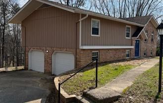 3 Bedroom 2 Bathroom Two Garage Doors Opening 