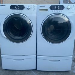 SAMSUNG WHITE EXTRA LARGE FRONT LOAD WASHER AND GAS DRYER SET WITH PEDESTAL 