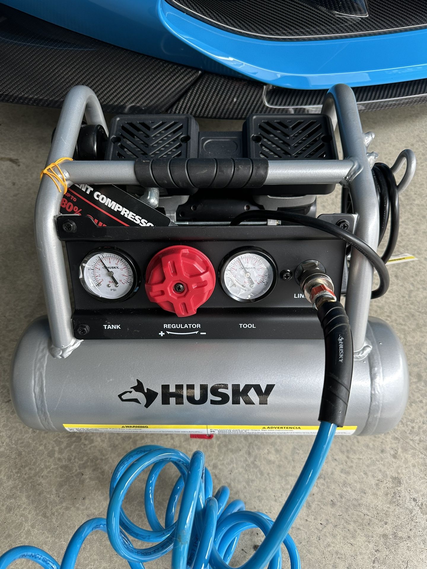 Husky 1 Gal. 135 PSI Portable Electric Oil-Free Quiet Jobsite Air Compressor with Dual Pressure Gauges and 1-Quick Coupler