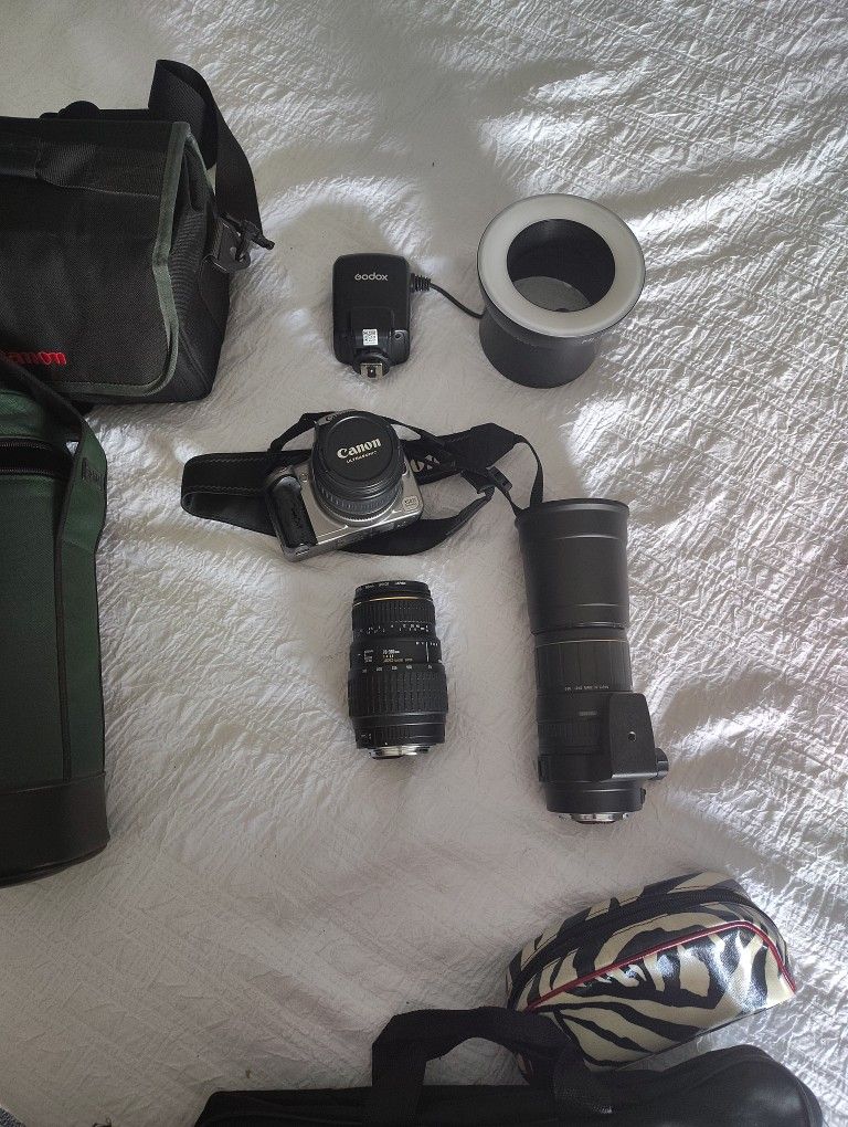 Canon EOS 350 Digital Camera W/ Extra Lenses.