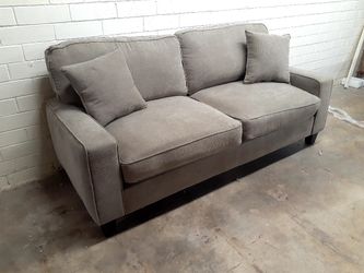 New modern sofa tan color pillows included see pictures for dimensions