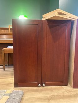 Two upper kitchen cabinets