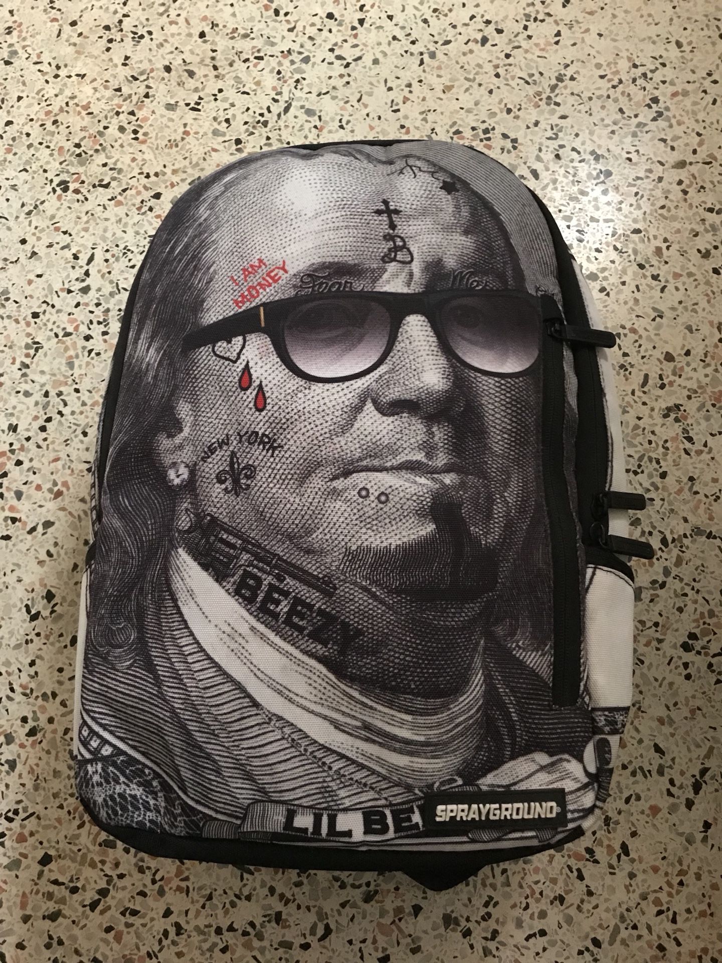 “Lil Benji” Sprayground Backpack With Hidden Pockets.