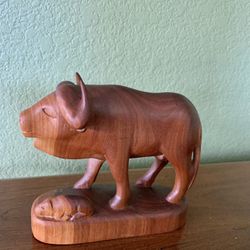 Carved water buffalo with a calf