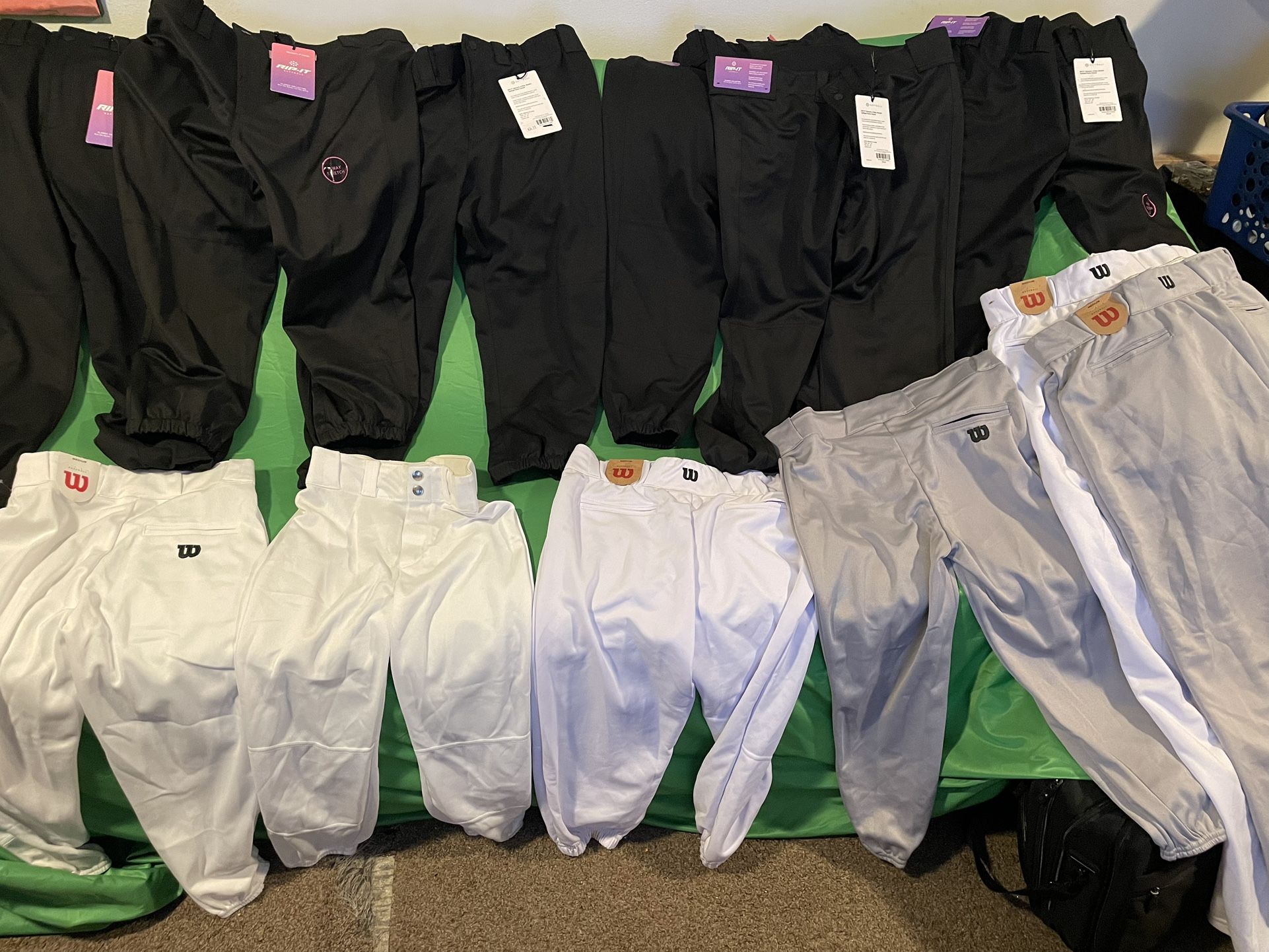 10-Piece Lots Of White And Gray, “Wilson” Men’s Baseball Pants, Sizes Youth To XL, New With Tags, $150.00.