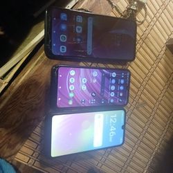 Three Phones Not Locked One Motorola With Little Crack In It And A Laptop A Tiny Laptop That Goes Right On Your Lap Or Great For Children Good For Pur