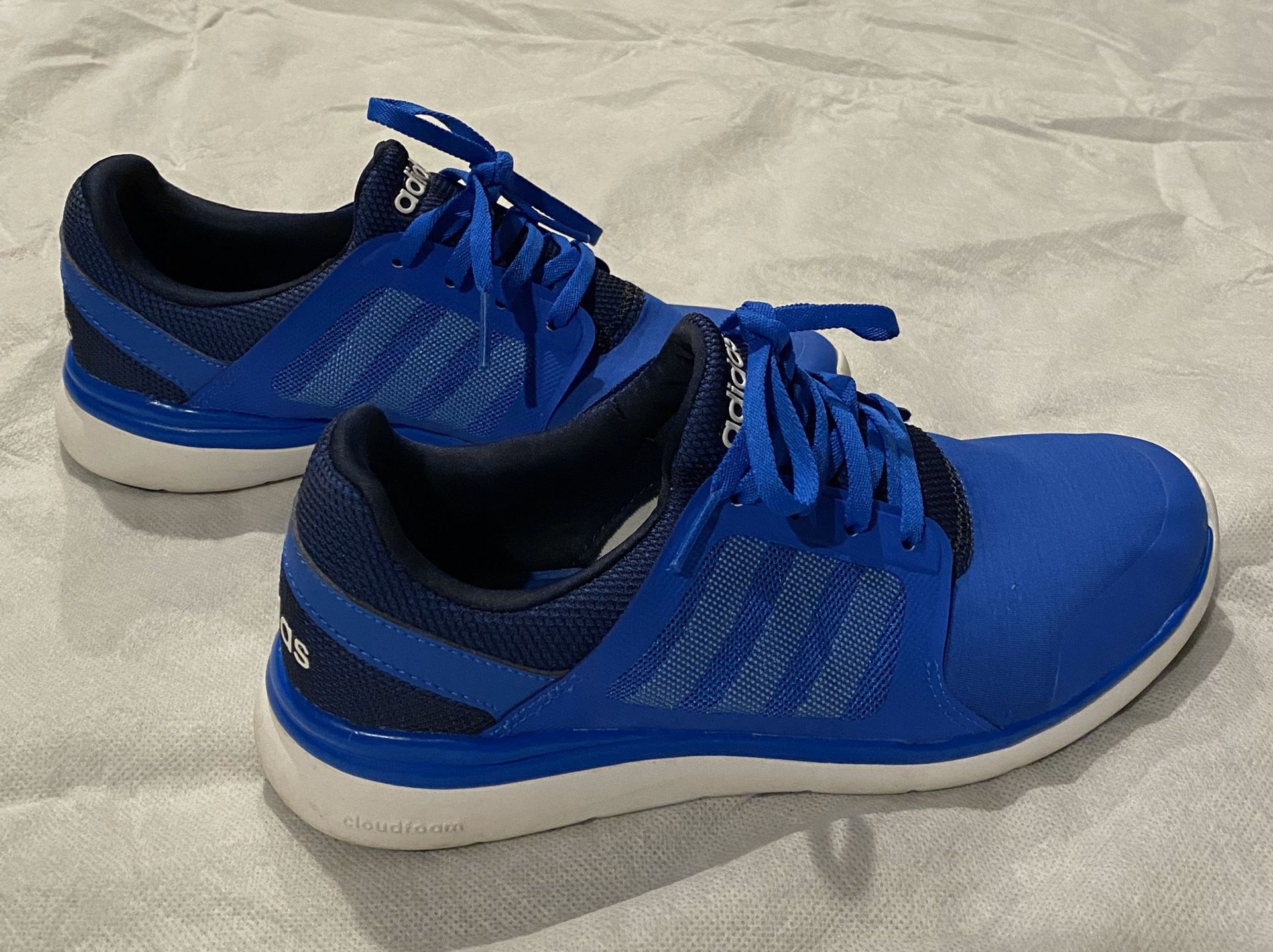 Blue and white Adidas brand shoes, women’s size 6; $25