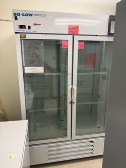 So-Low Environmental Equipment double-door glass laboratory refrigerator. It’s acting up and filled with Freon working now, but not sure if it has a