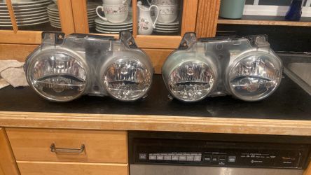 Left and right headlights 04 jaguar xj8 and other years up