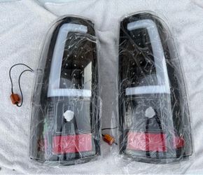 99-06 Chevy Silverado Sierra Black LED Bar Tail Lights