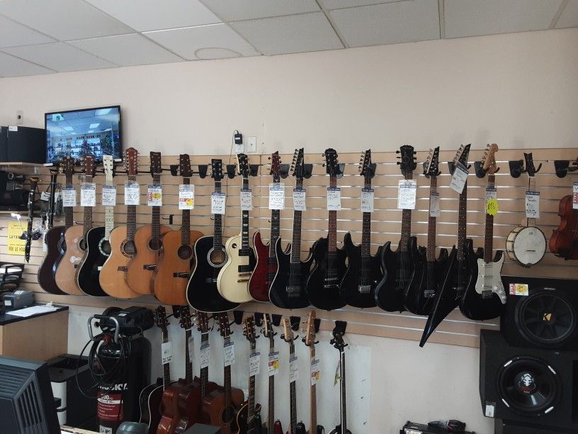 Guitars Electric And Acoustic 