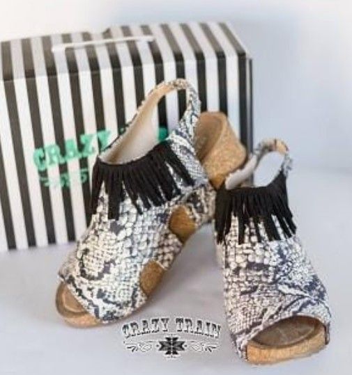 Crazy Train Stomp Right There Snake Black Wedges W/Fringe Size 7

New With Tags!

**Bundle and save with combined shipping**
l