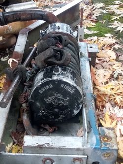 12,000 # rhino pto winch on a chevy channel iron made bumper $250