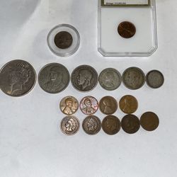 A very nice lot of silver American foreign also wheat pennies, Indian penniesnd