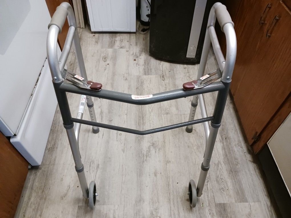 Assisted Walker With Rolling Wheels On Front Legs