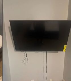 2 flat screens both with remote