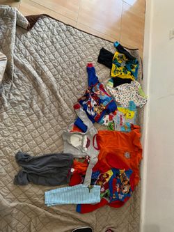9 pairs of pj’s 12-18m