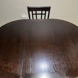 Like-New 4-Piece Round/Oval Dinette Set – Dark Brown Wood