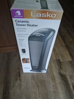Lasso ceramic tower heater with remote