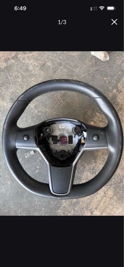 Original Tesla model 3 steering wheel some peeling