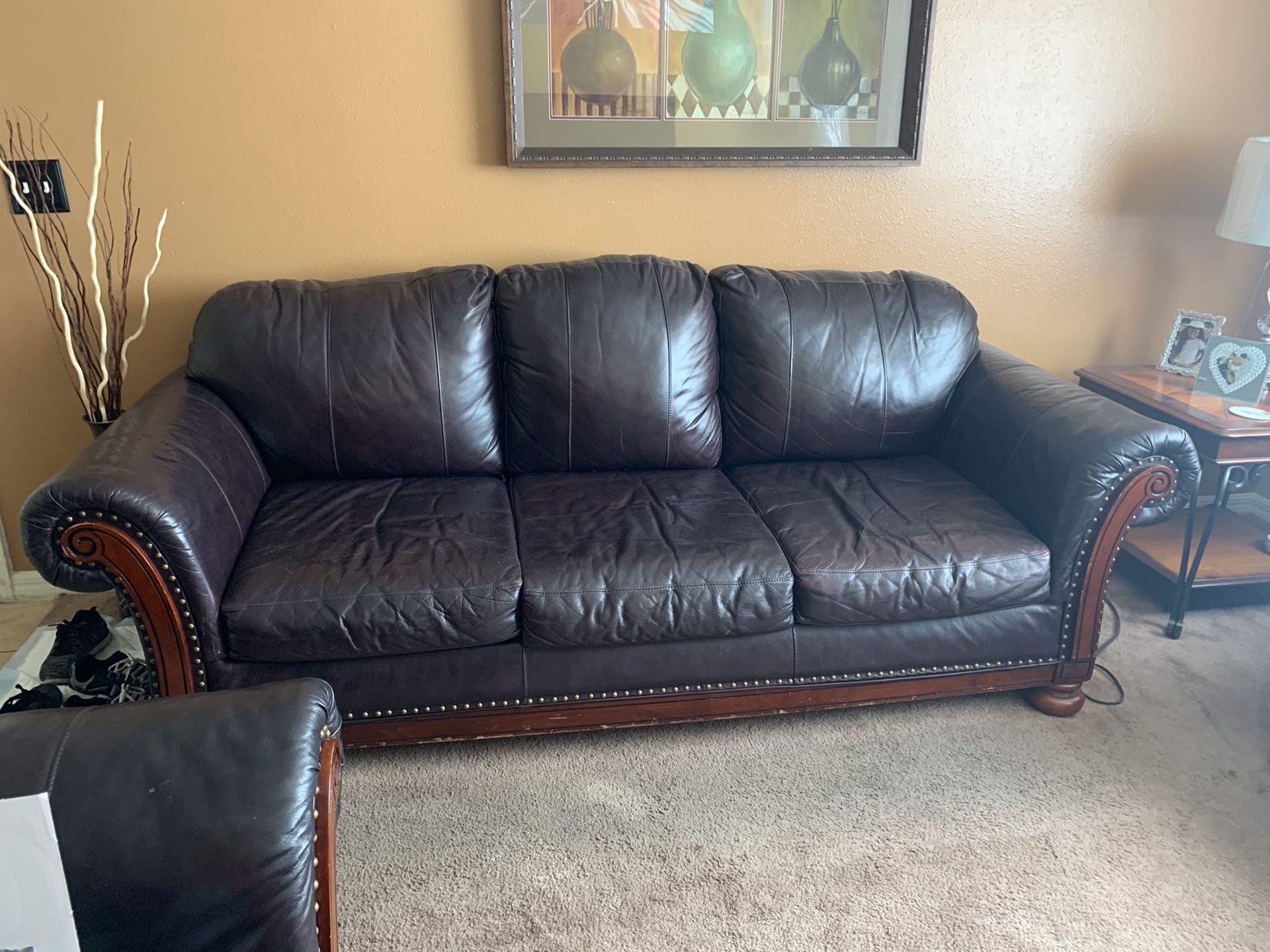 A sofa and a love seat plus 2 end table