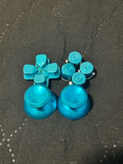 Blue chrome buttons and thumb sticks for PS4 controller