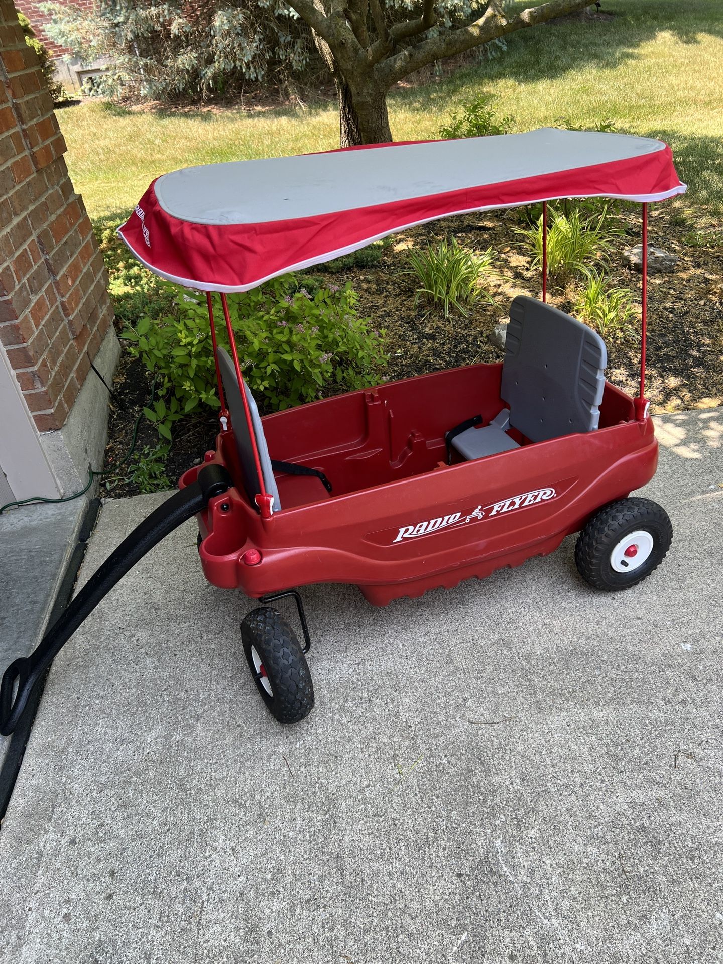 Radio Flyer Deluxe Wagon with Canopy and All Terrain Tires. I’m Excellent Shape