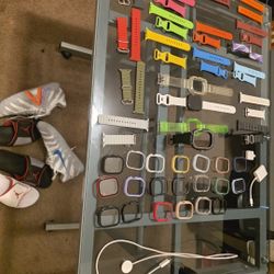 Apple Ultra Watch 46mm With Alot Of Accessories And A CREDIT card Reader, A SD TRANSFER AND 3 CHARGERS WITH SCREEN PROTECTORS BANDS AND CASES