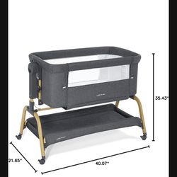 Baby rocking bassinet with wheels