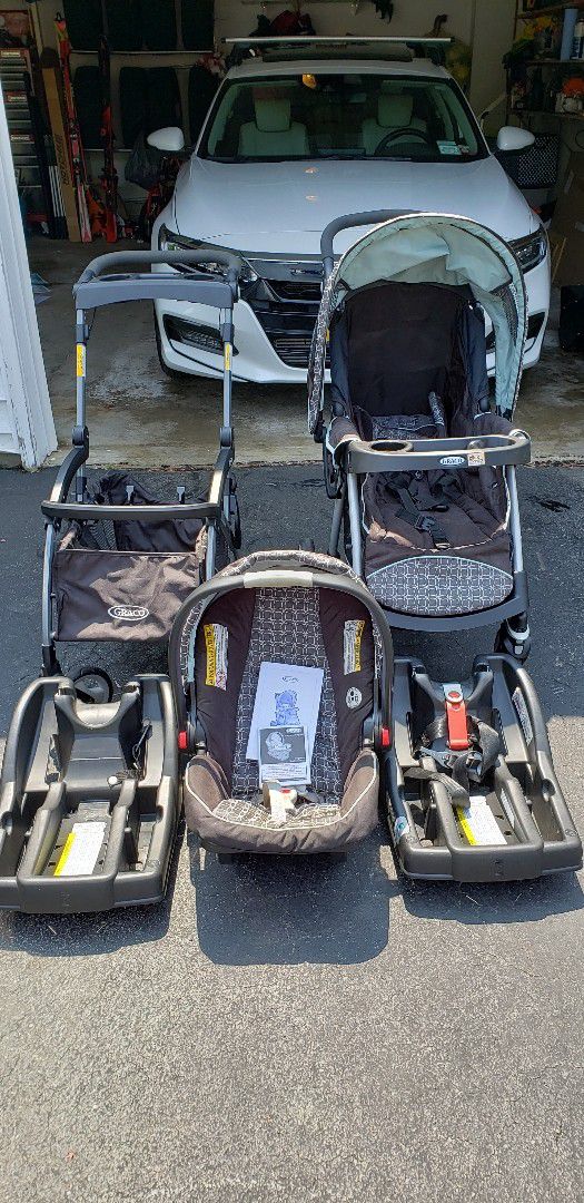 Graco click connect stroller, car seat and two bases.