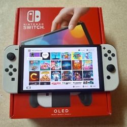 NINTENDO SWITCH OLED with 512GB And 7500 GAMES