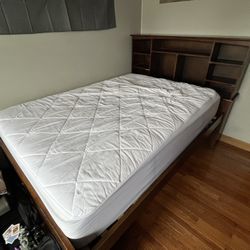 Full Size Brown Captains Bed With Shelf’s As Backboard 