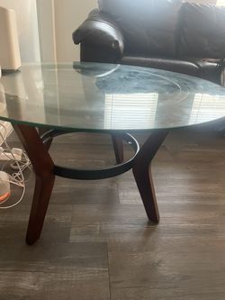 Two Piece Sofas And Two End Tables And Middle Round All Glass Table
