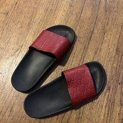 Red Gucci slides