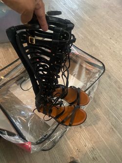 Knew high sandals