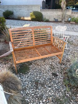Safavieh Outdoor Wood Patio Bench – 47” – Includes Cushions  Description: Beautiful Safavieh wooden outdoor patio bench with a classic slatted design 