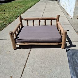 Handcrafted wooden dog bed.     $40  OBO