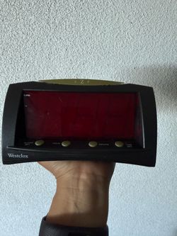 Westclox brand digital alarm clock features a red LED display