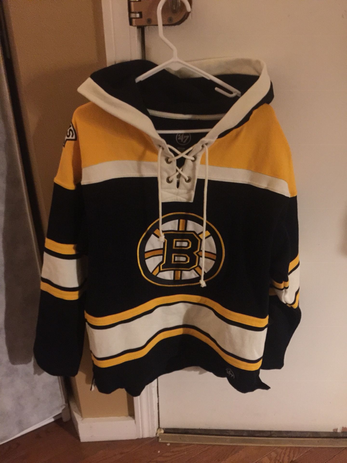 Brand new original bruins jersey size medium fit large too