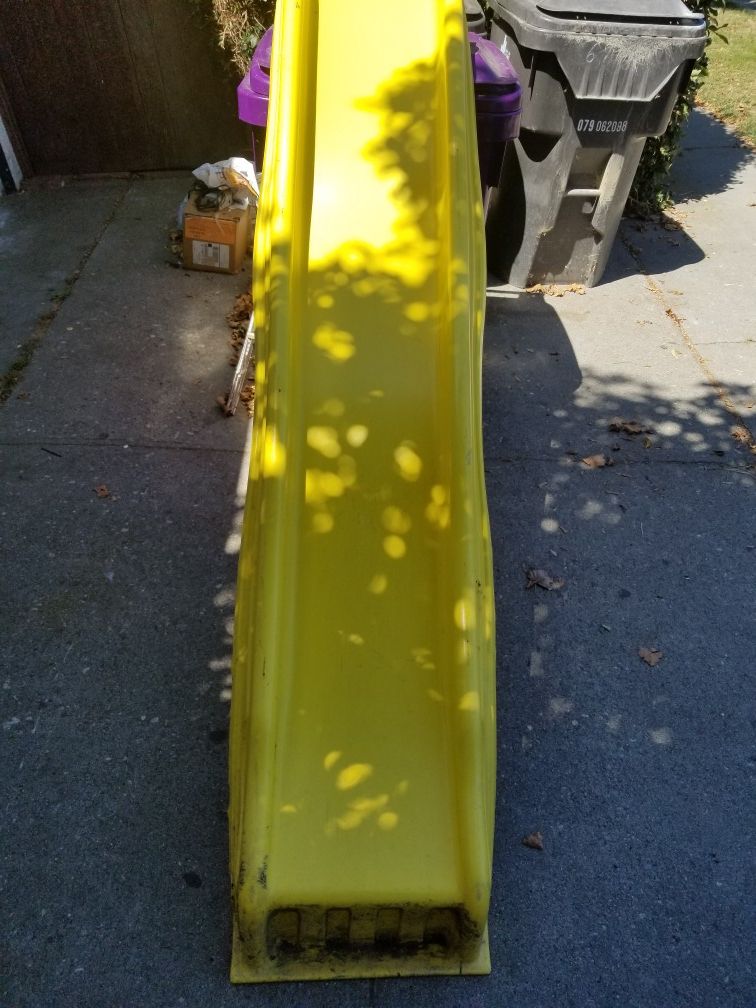 $25 Children's slide (Swing-N-Slide). 4 1/2' drop(you can vary accordingly). No cracks, slightly dirty, a dog bite or two, easily remedied.