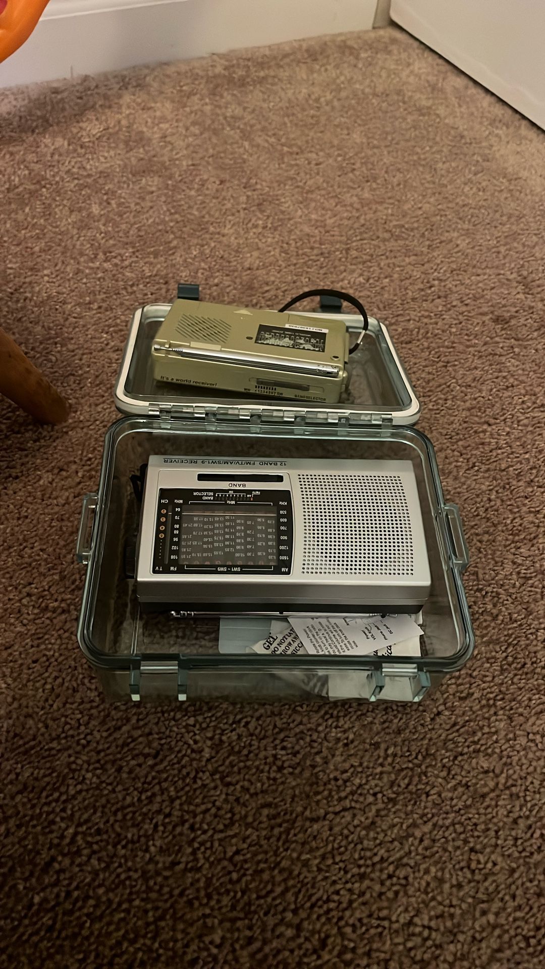 Two Portable Radios And Case